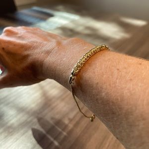 Kendra Scott filigree gold tone bracelet.